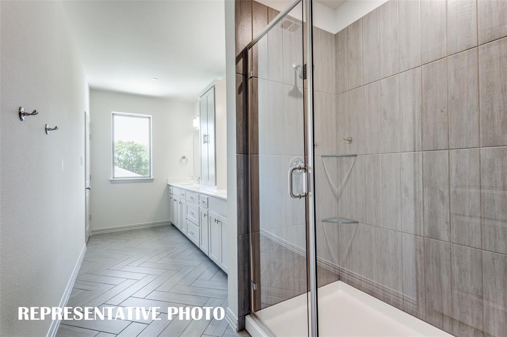 2848 Chisos Red Road McKinney, TX 75071 - Photo 9 of 16 Your new owner's bath comes complete with an oversized, walk in shower. REPRESENTATIVE PHOTO