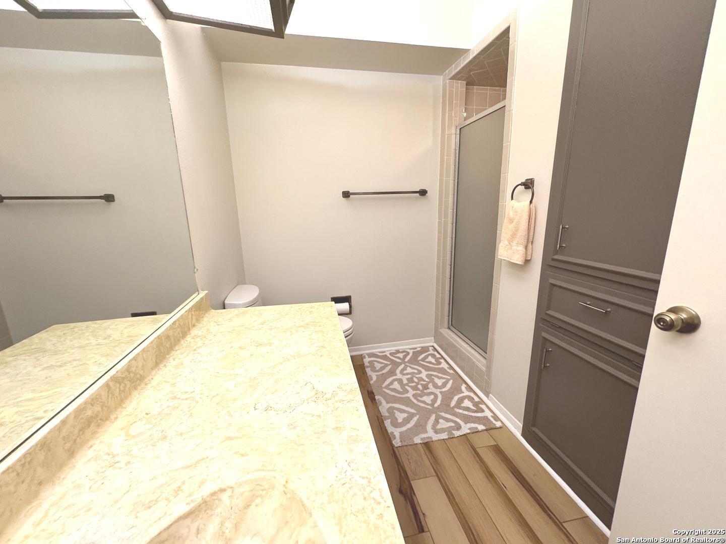 7500 Callaghan, Unit 254 San Antonio, TX 78229 - Photo 16 of 36 a bathroom with a bathtub and shower