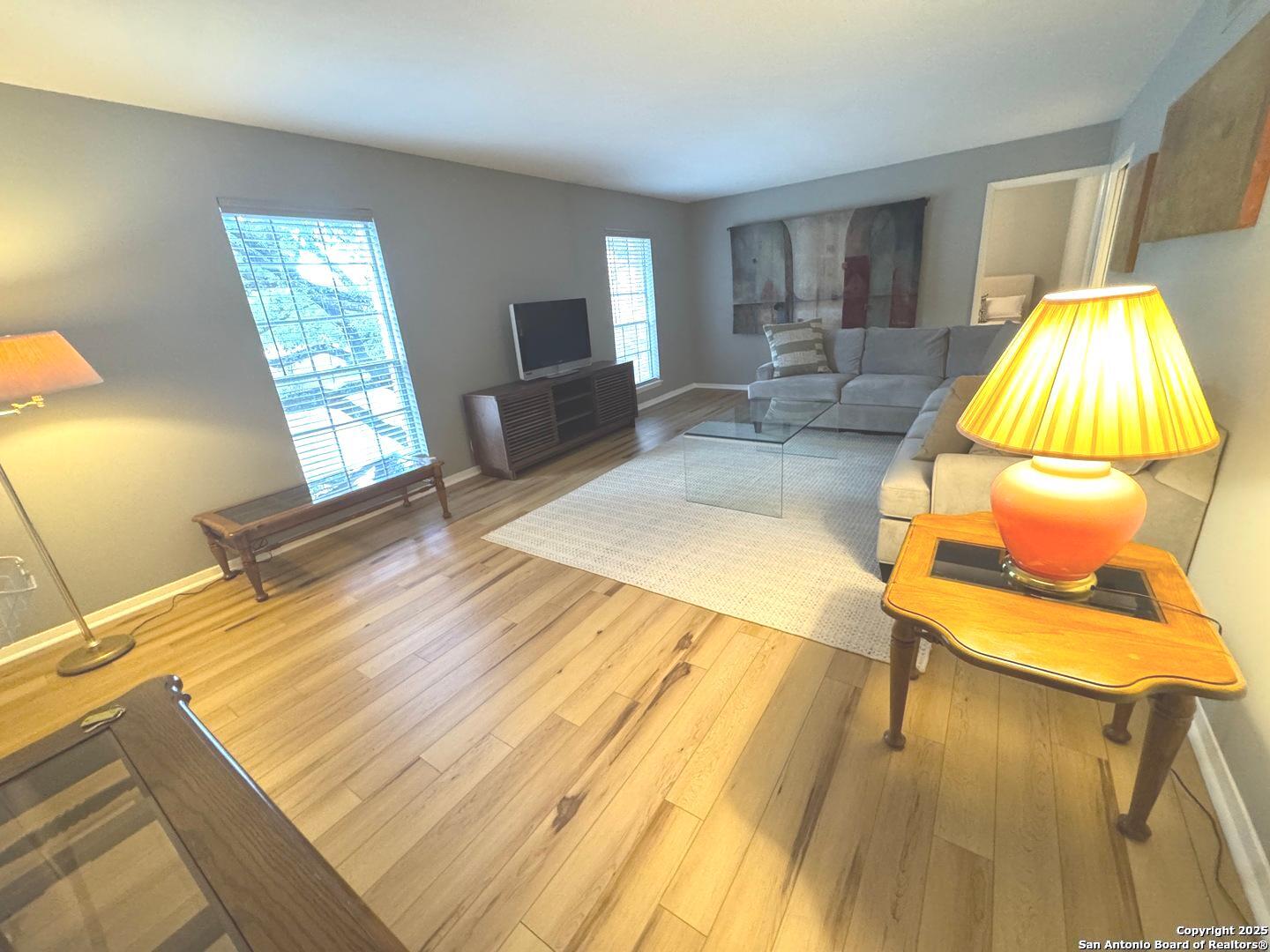 7500 Callaghan, Unit 254 San Antonio, TX 78229 - Photo 8 of 36 a bed room with a bed and window