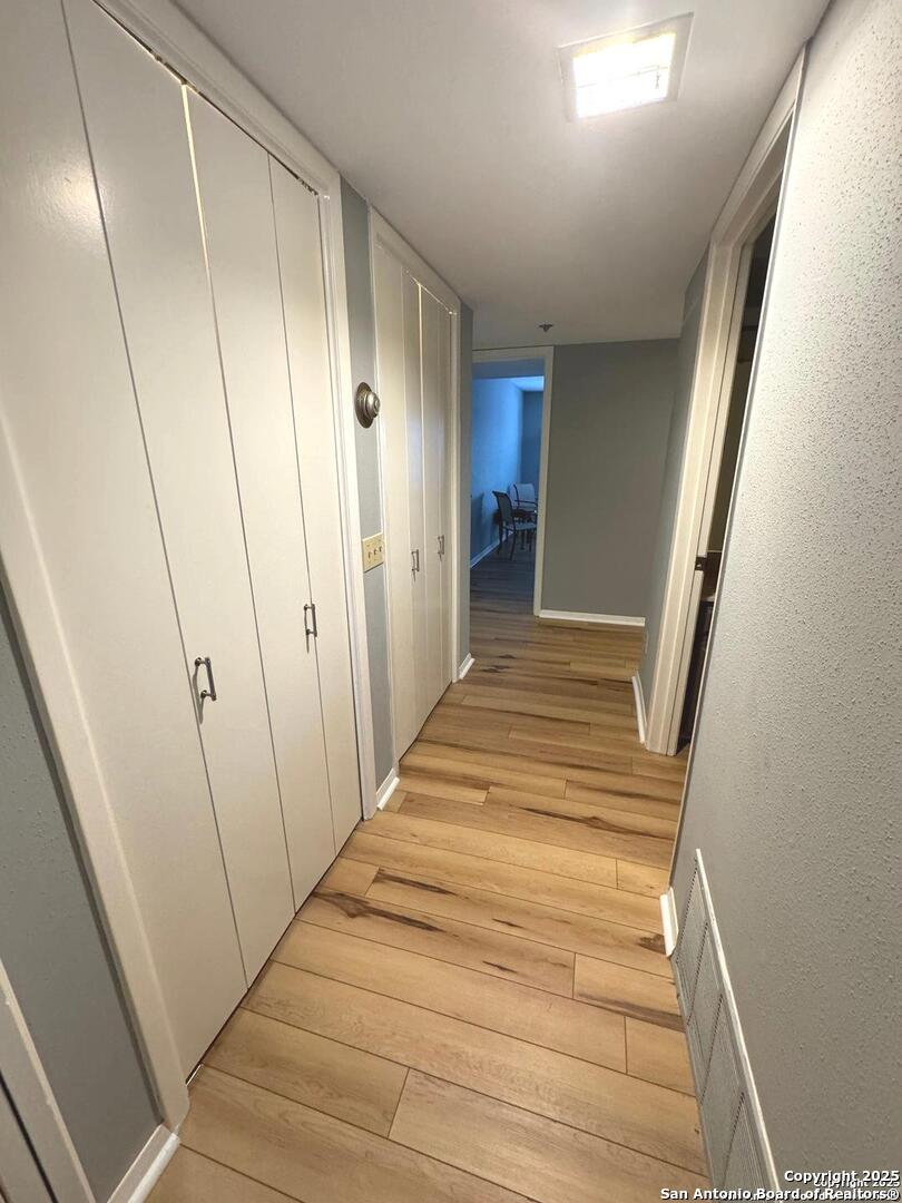 7500 Callaghan, Unit 254 San Antonio, TX 78229 - Photo 10 of 36 a view of a hallway