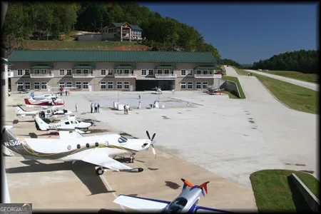 a view of swimming pool with outdoor seating