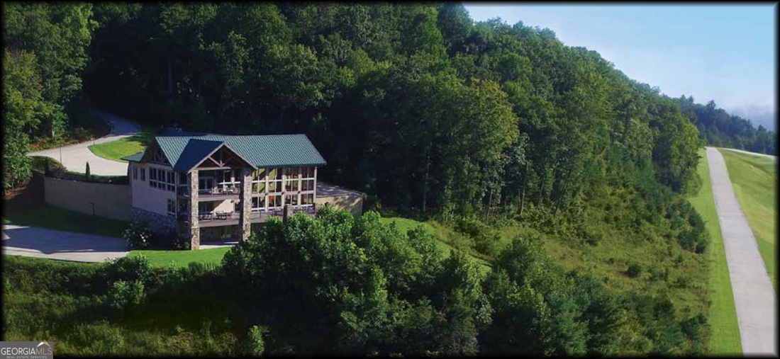 Lot 121 Doolittle Drive Rabun Gap, GA 30568 - Photo 16 of 19 an aerial view of a house