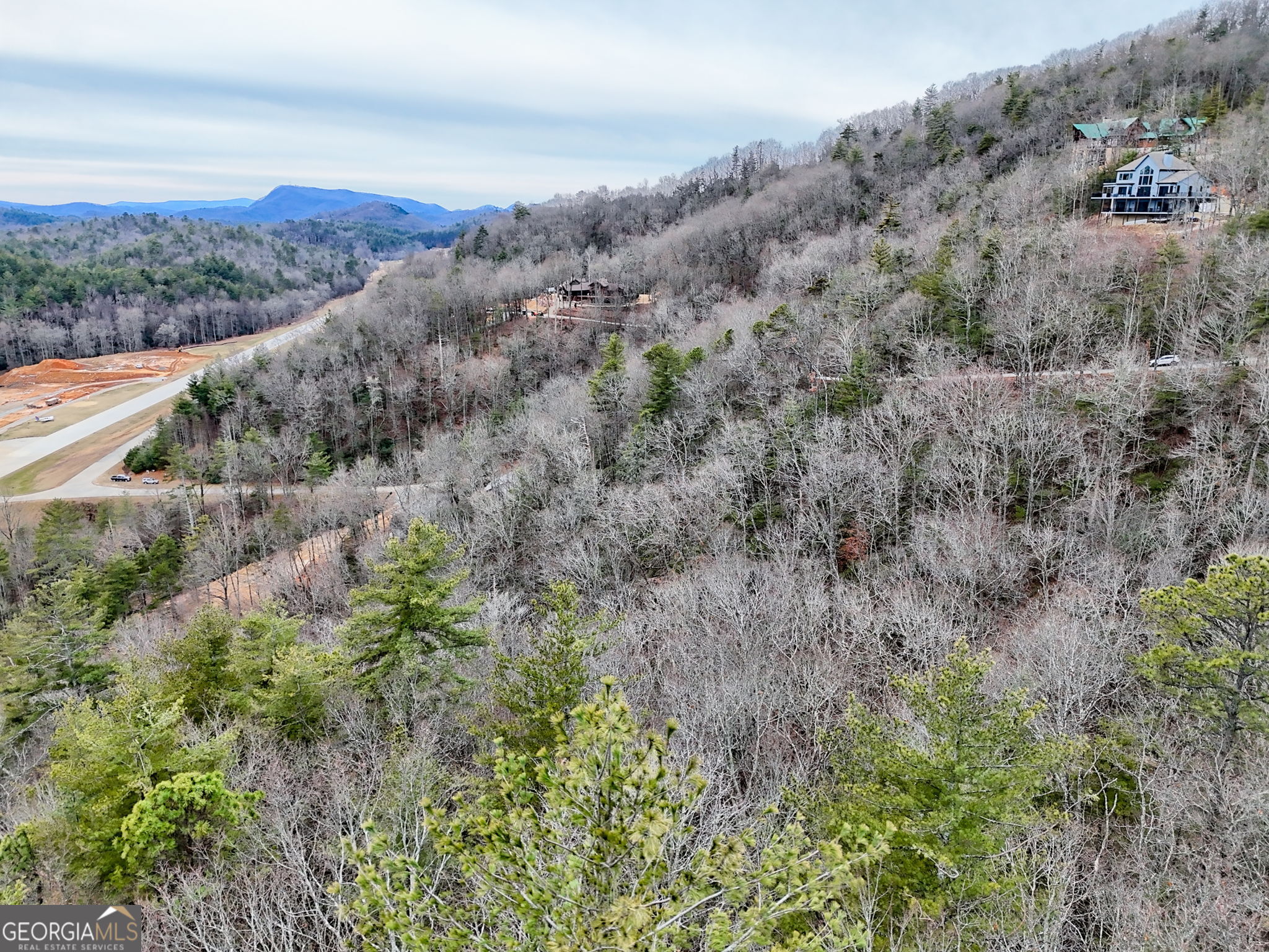Lot 121 Doolittle Drive Rabun Gap, GA 30568 - Photo 5 of 19 a view of a forest with mountains in the background
