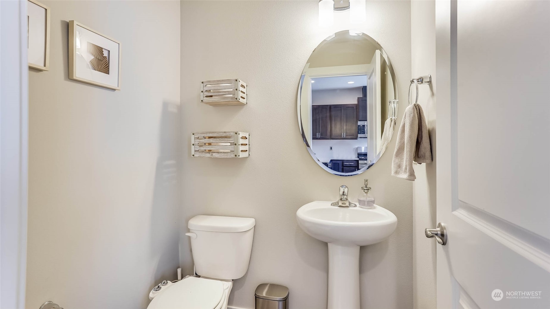 3517 193rd Street Southeast, Unit F Bothell, WA 98012 - Photo 15 of 33 a bathroom with a toilet sink and mirror