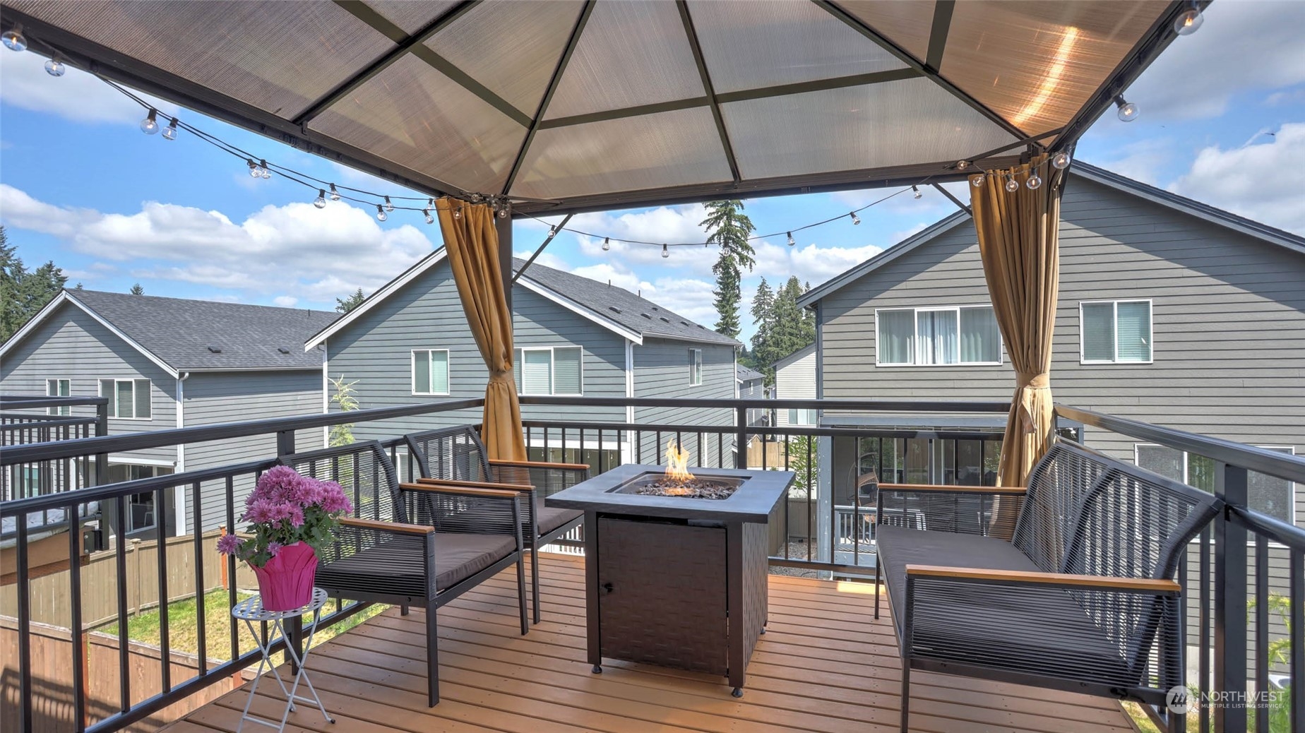 3517 193rd Street Southeast, Unit F Bothell, WA 98012 - Photo 16 of 33 a view of a house with wooden deck and furniture