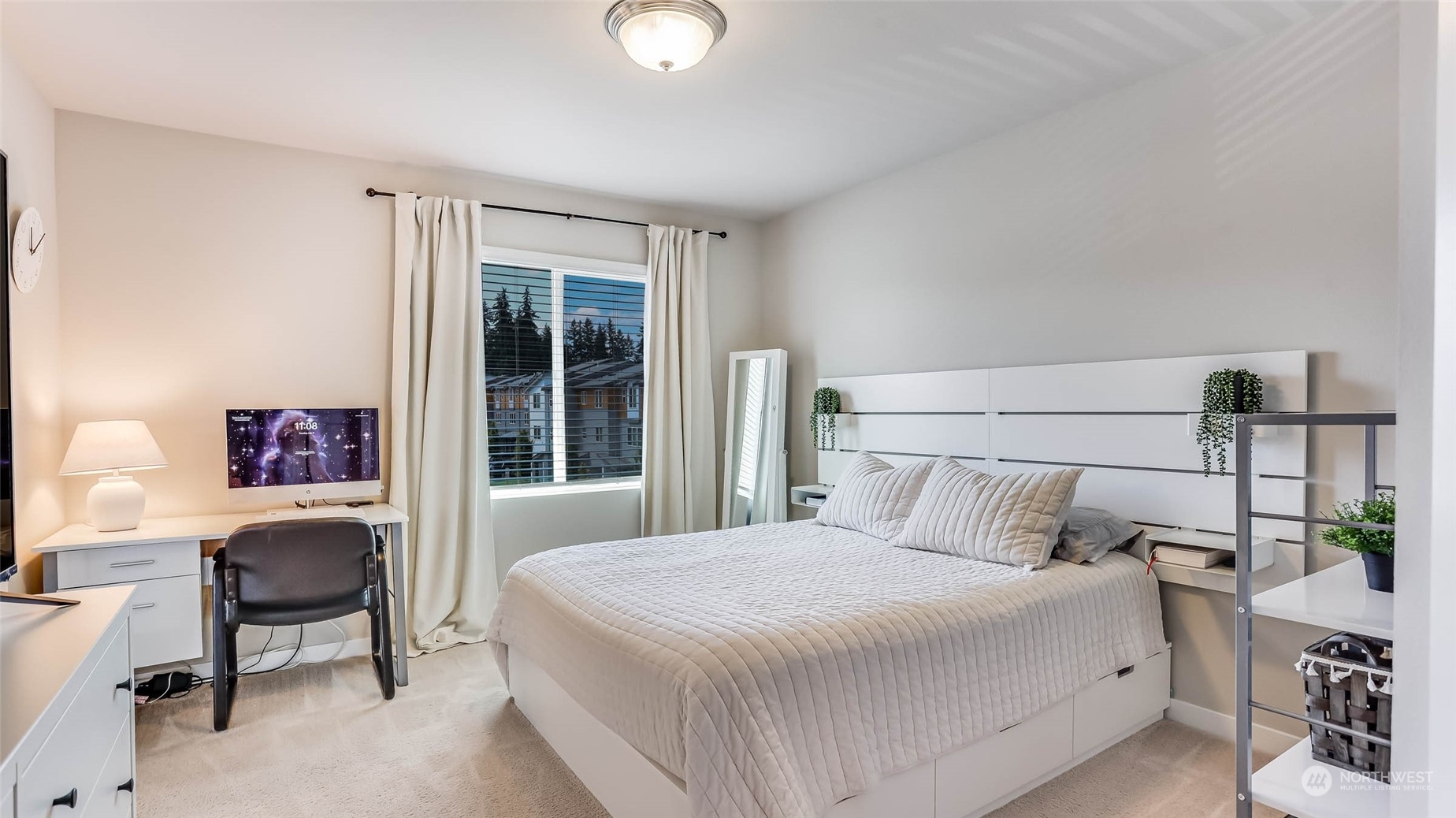 3517 193rd Street Southeast, Unit F Bothell, WA 98012 - Photo 19 of 33 a bedroom with a bed and a window