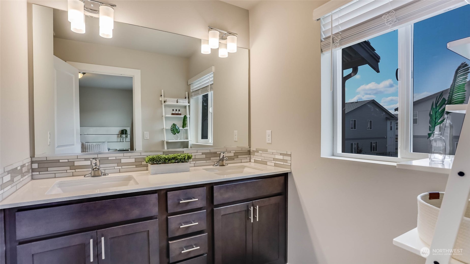 3517 193rd Street Southeast, Unit F Bothell, WA 98012 - Photo 21 of 33 a bathroom with a double vanity sink and a mirror