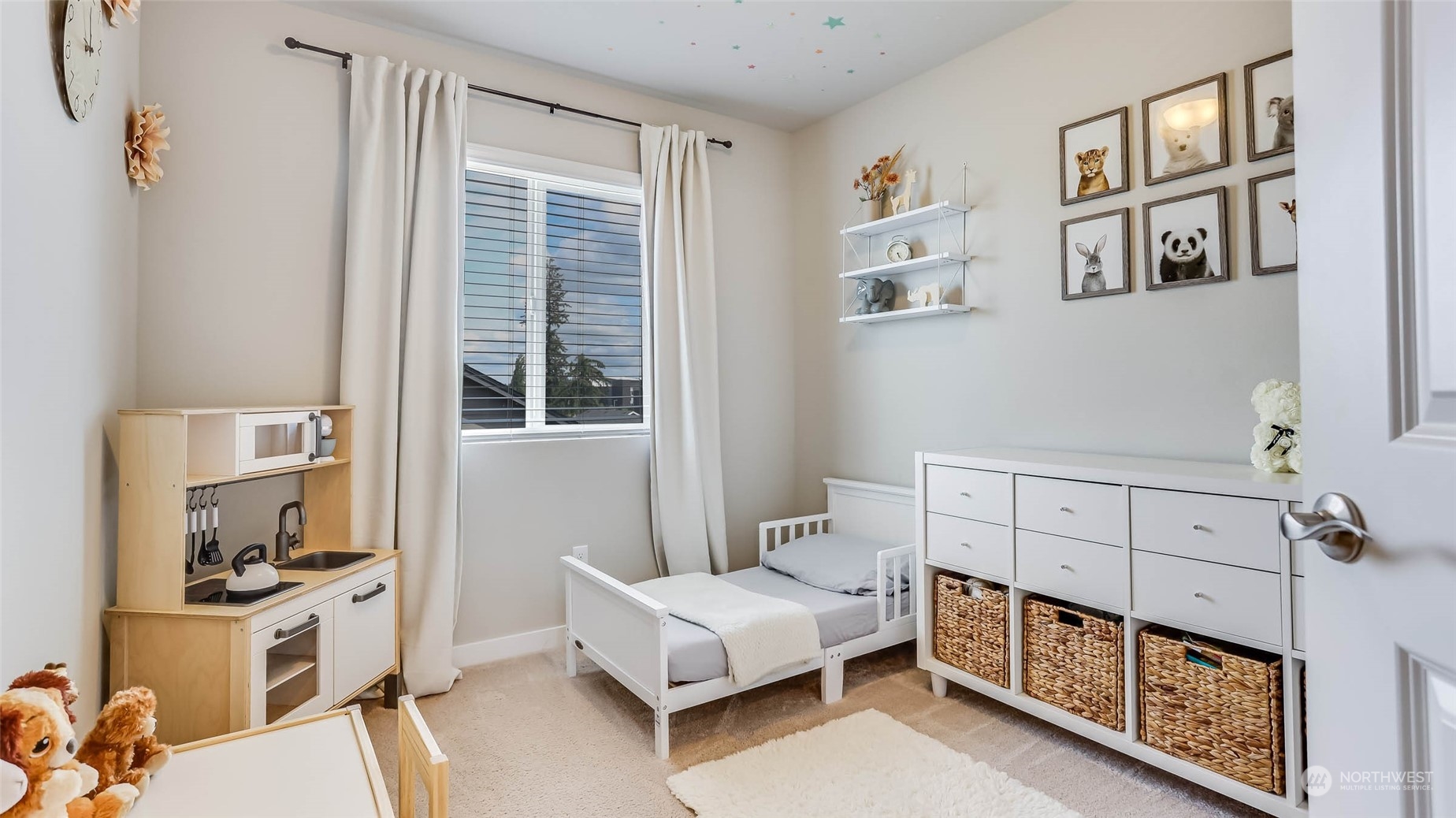 3517 193rd Street Southeast, Unit F Bothell, WA 98012 - Photo 22 of 33 a bedroom with furniture and white walls