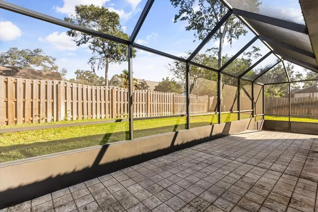 a view of a swimming pool with a backyard