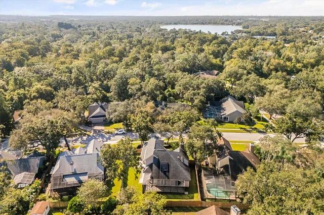 an aerial view of residential building and parking space