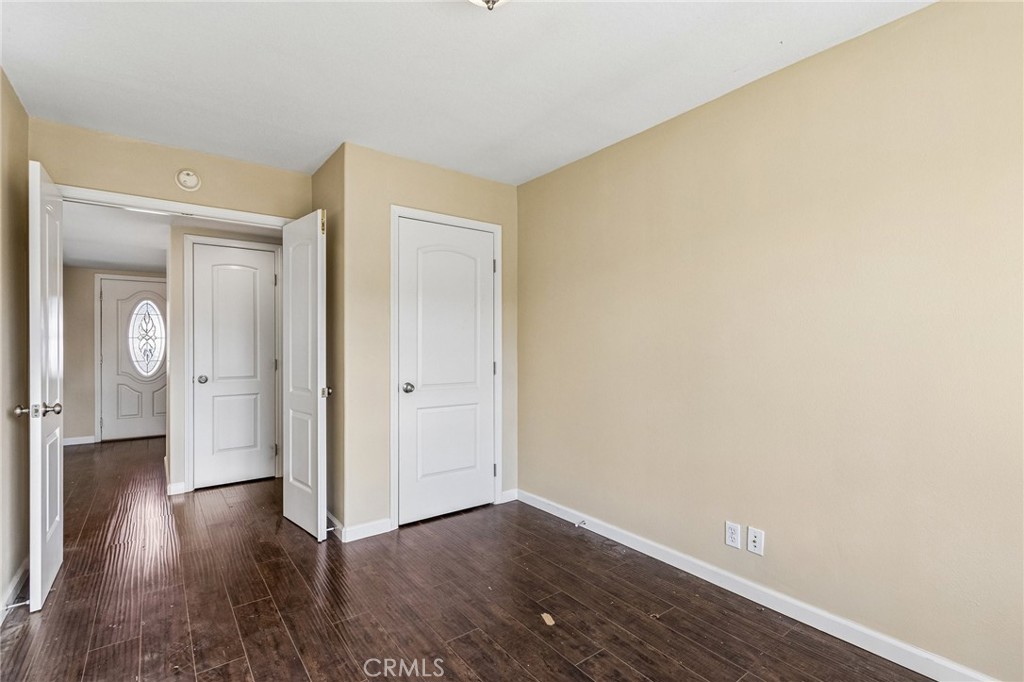 486 South Rall Avenue La Puente, CA 91746 - Photo 21 of 42 a view of a hallway with wooden floor