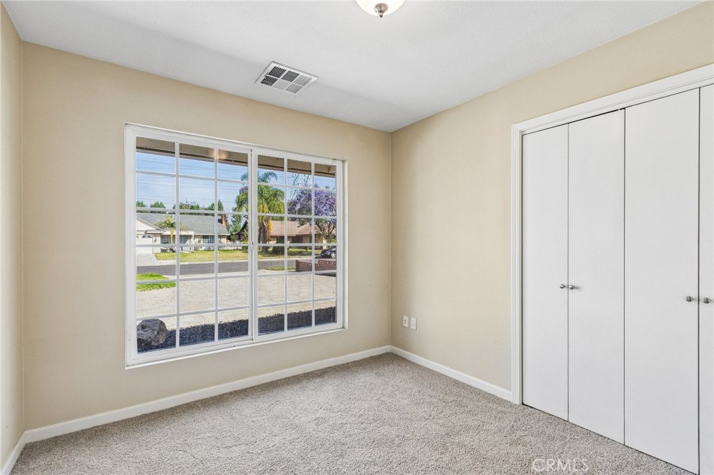 486 South Rall Avenue La Puente, CA 91746 - Photo 24 of 42 a room with a wooden floor and a window