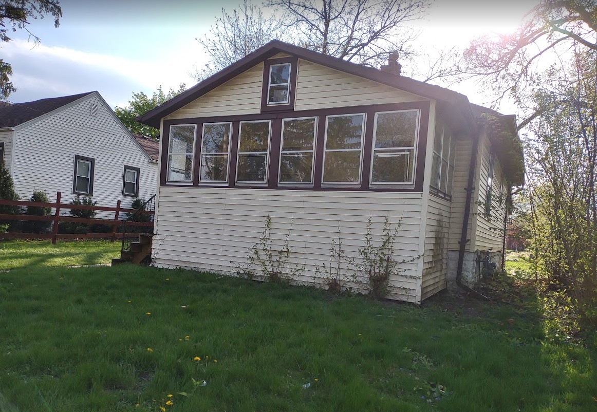 329 Albert Boulevard Kankakee, IL 60901 - Photo 12 of 12 a view of a house with a yard