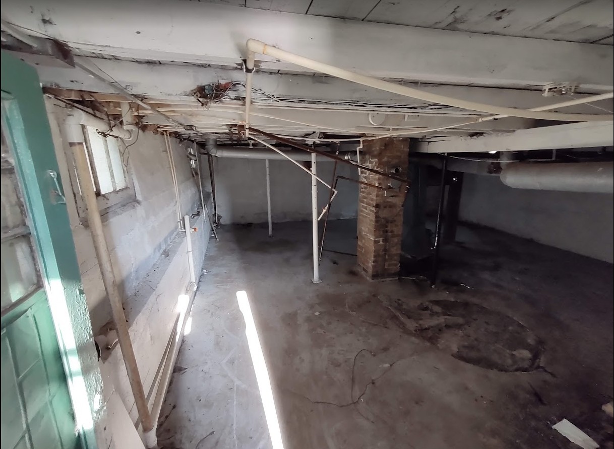 329 Albert Boulevard Kankakee, IL 60901 - Photo 8 of 12 a view of a room with racks