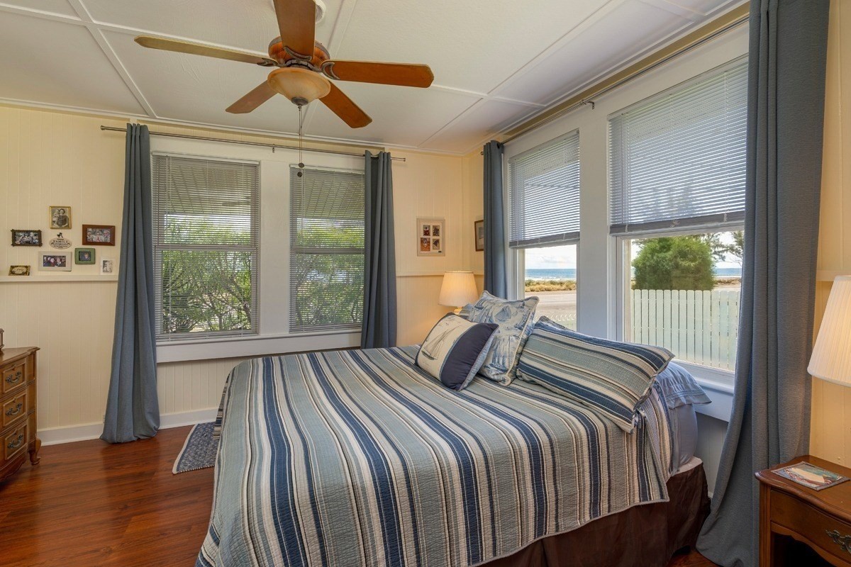 8706 Kiowea Road Kekaha, HI 96752 - Photo 11 of 30 a bedroom with a large bed and a window