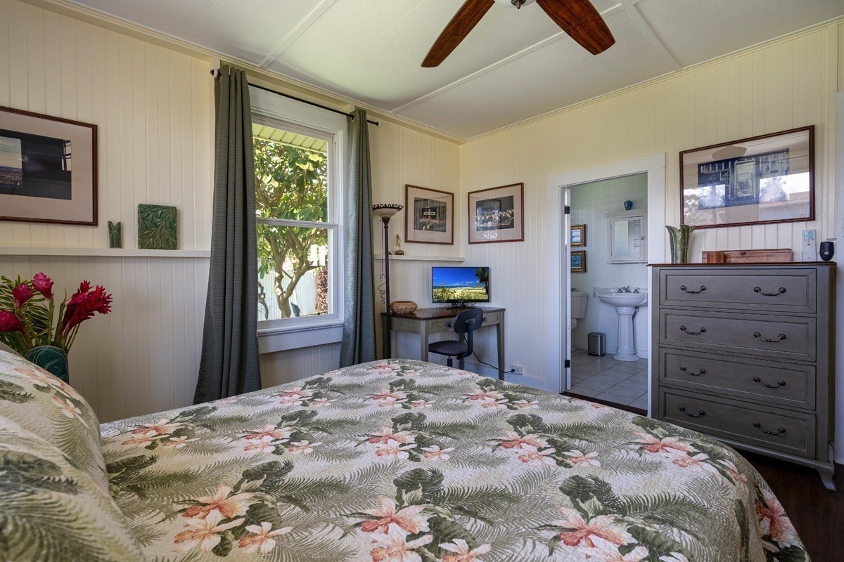 8706 Kiowea Road Kekaha, HI 96752 - Photo 15 of 30 a bedroom with a bed and a dresser