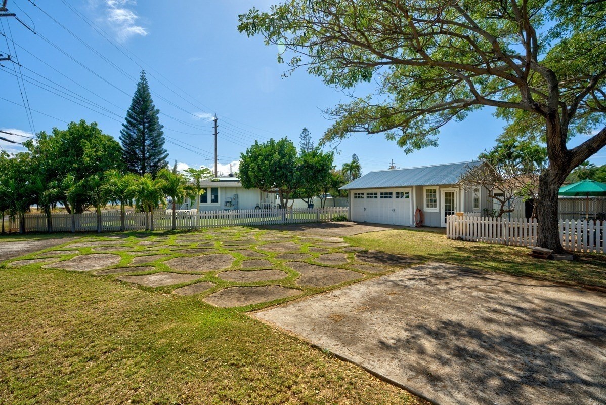8706 Kiowea Road Kekaha, HI 96752 - Photo 21 of 30 a view of a house with a yard and tree s