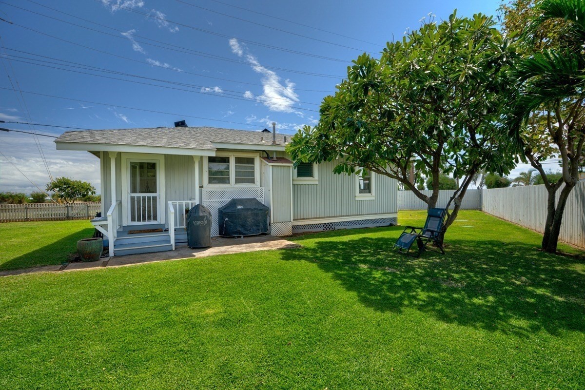8706 Kiowea Road Kekaha, HI 96752 - Photo 4 of 30 front view of a house with a yard