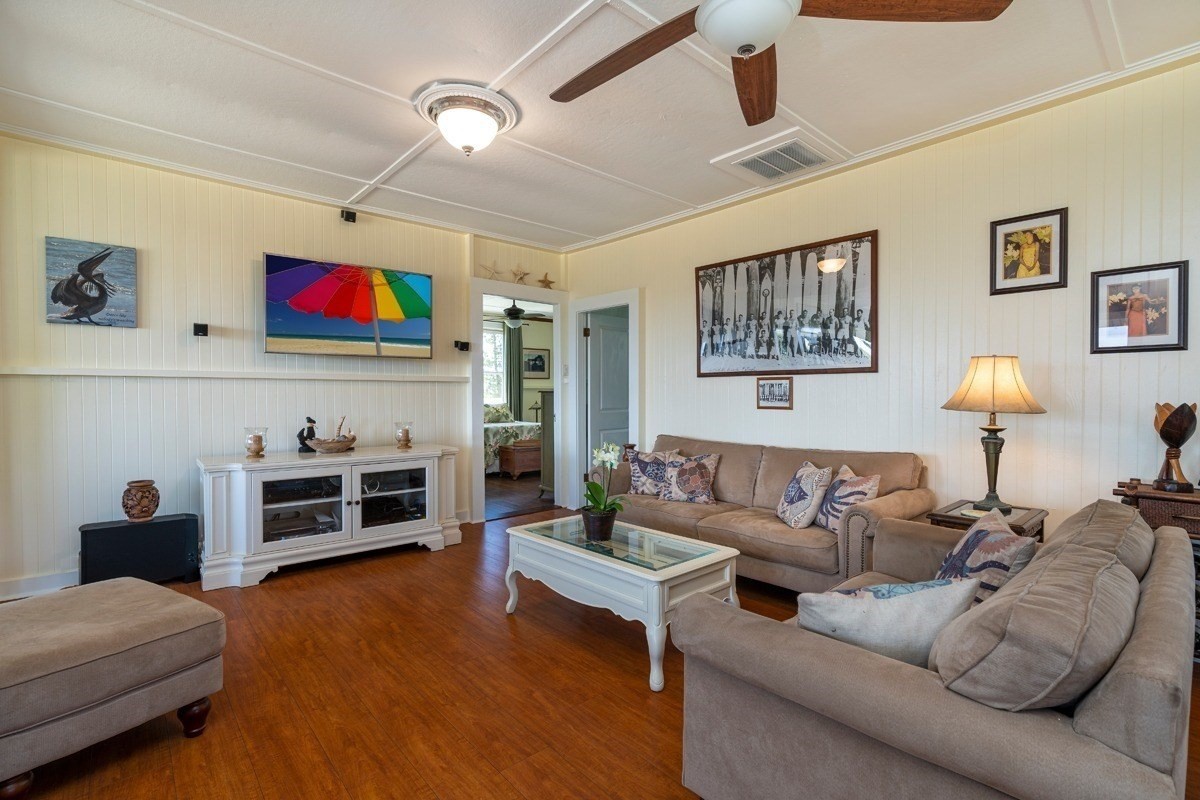 8706 Kiowea Road Kekaha, HI 96752 - Photo 9 of 30 a living room with furniture and a flat screen tv