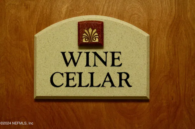 a sign that is on a wooden wall