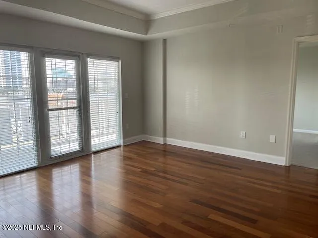 a view of a livingroom with wooden floor