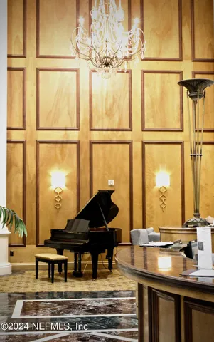 a living room with a table and window