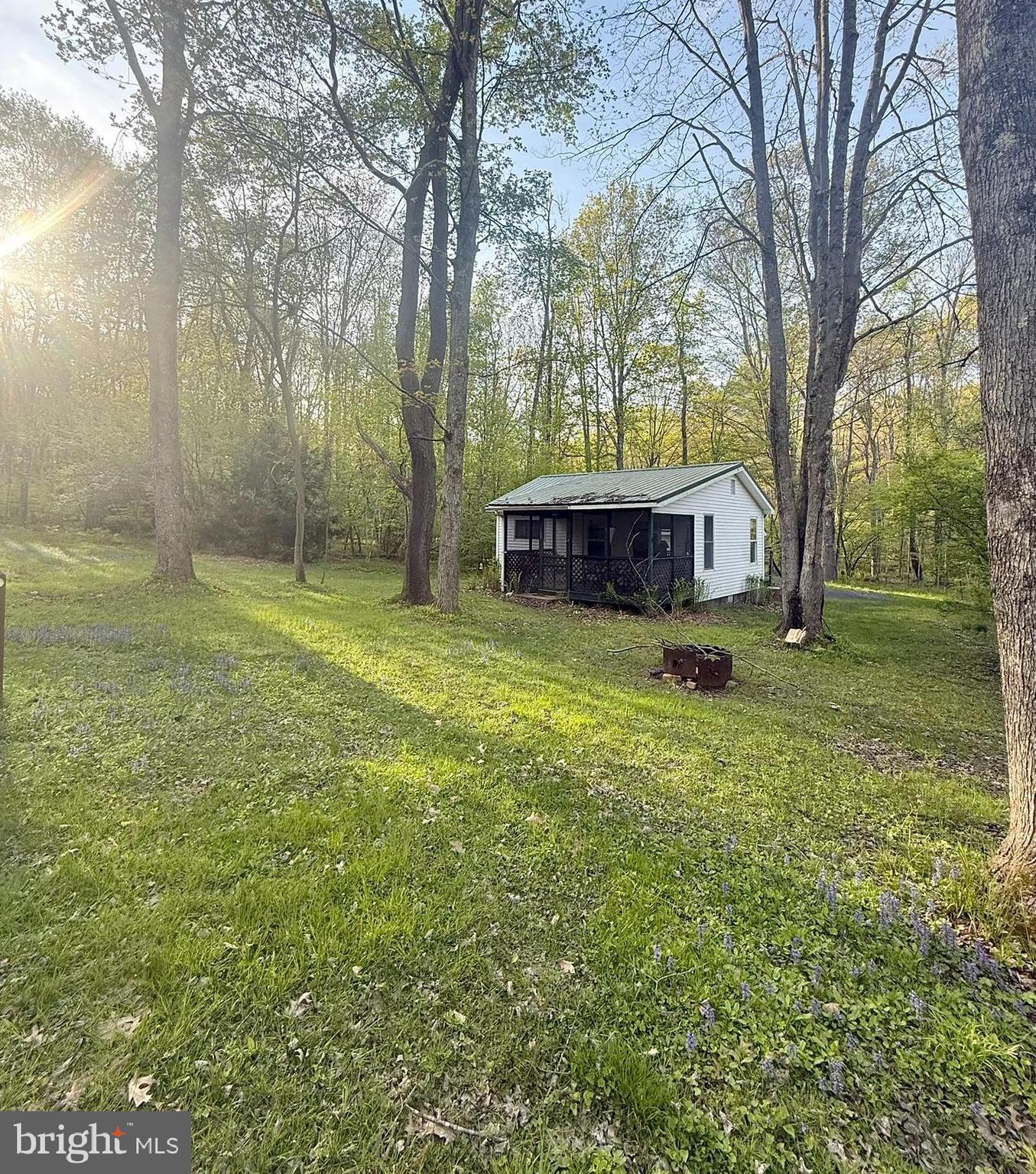 122 Tobyhanna Road Philipsburg, PA 16866 - Photo 1 of 17 a view of a house with yard and sitting area