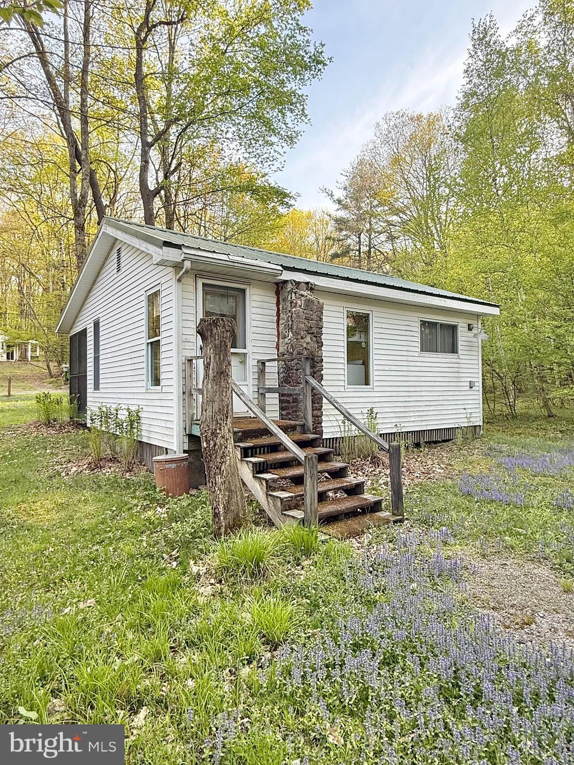 122 Tobyhanna Road Philipsburg, PA 16866 - Photo 5 of 17 a backyard of a house with seating space
