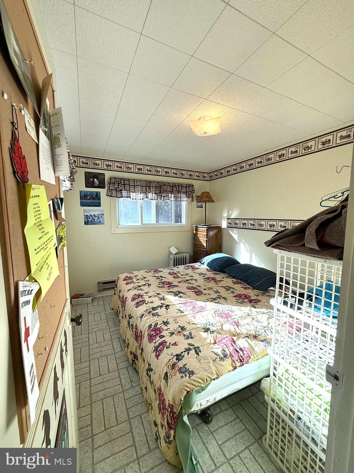 122 Tobyhanna Road Philipsburg, PA 16866 - Photo 10 of 17 a bedroom with a bed and a window