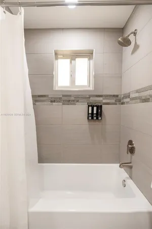 a bathroom with a bathtub