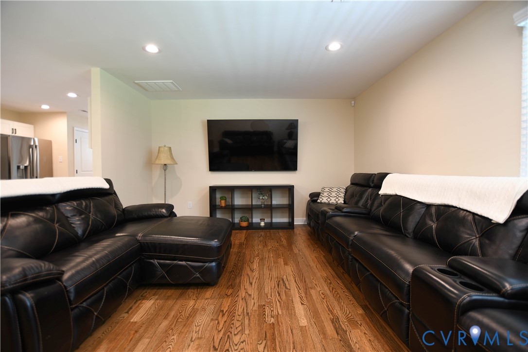 1448 Canterbury Road St. Stephens Church, VA 23148 - Photo 9 of 57 Spacious room featuring wood-finish flooring, rece