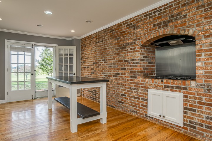 88 Lakeland Drive McMinnville, TN 37110 - Photo 25 of 41 a living room with a wooden floor and flat screen tv