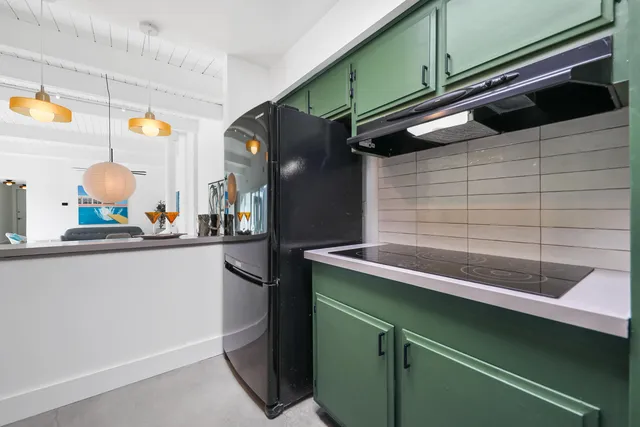 a view of a hallway with seating area