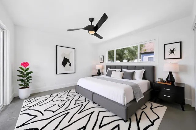 a utility room with cabinets washer and dryer