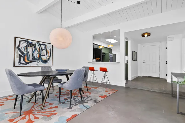 a view of livingroom and dining room with furniture