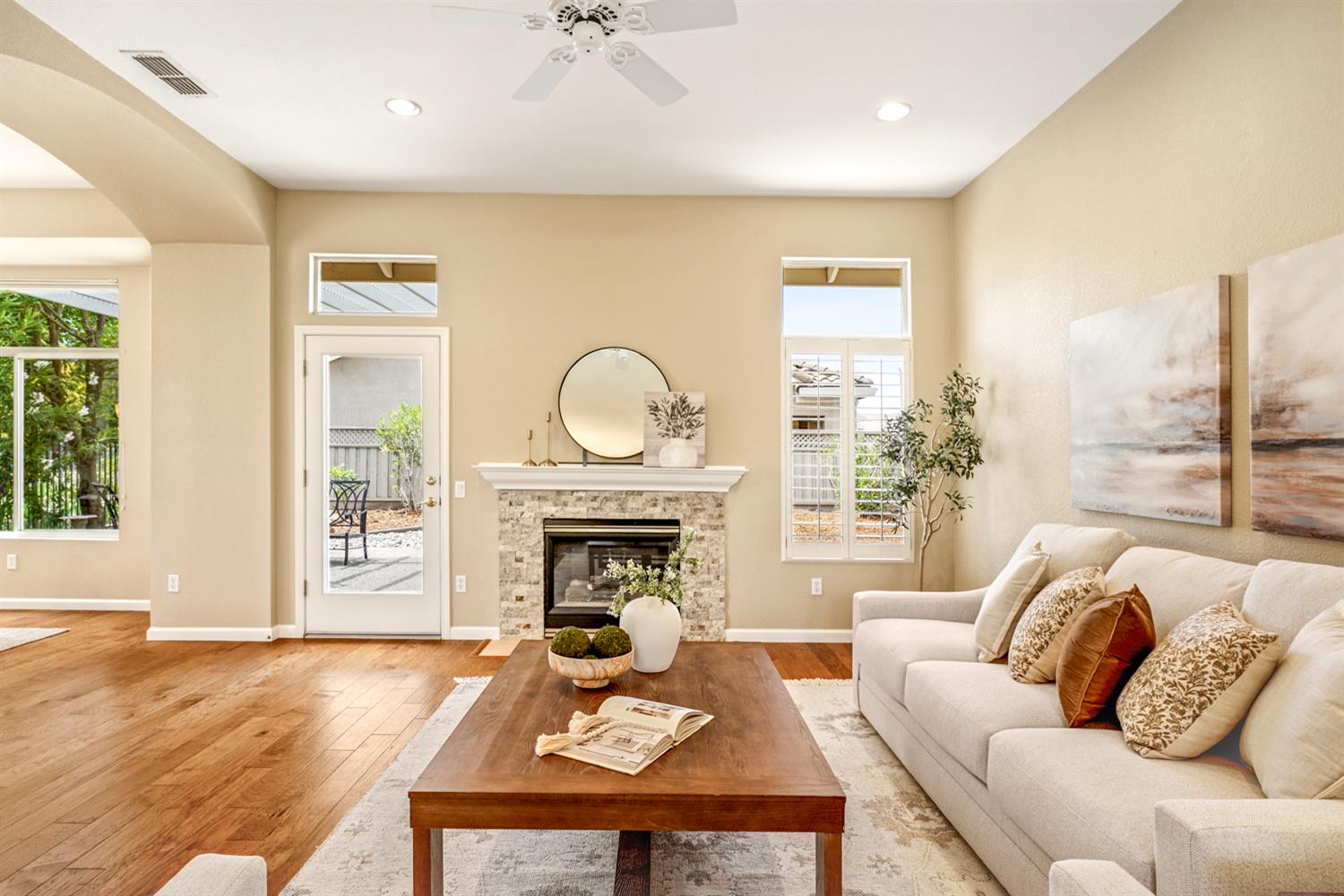 4081 Rose Creek Road Roseville, CA 95747 - Photo 11 of 52 a living room with furniture a fireplace with wooden floor