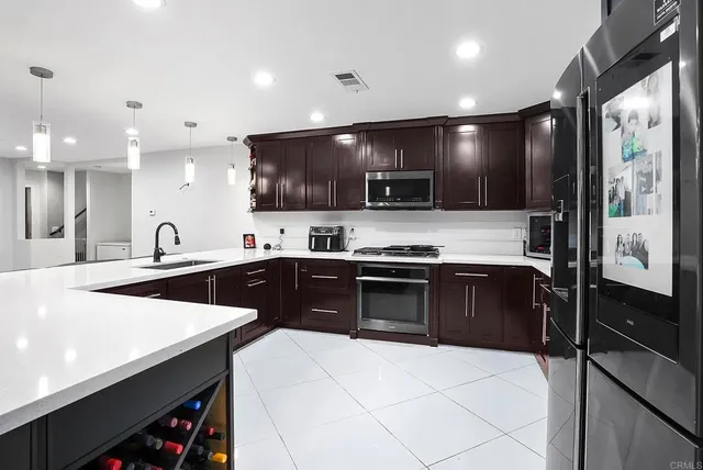 a bathroom with a toilet a sink and a mirror