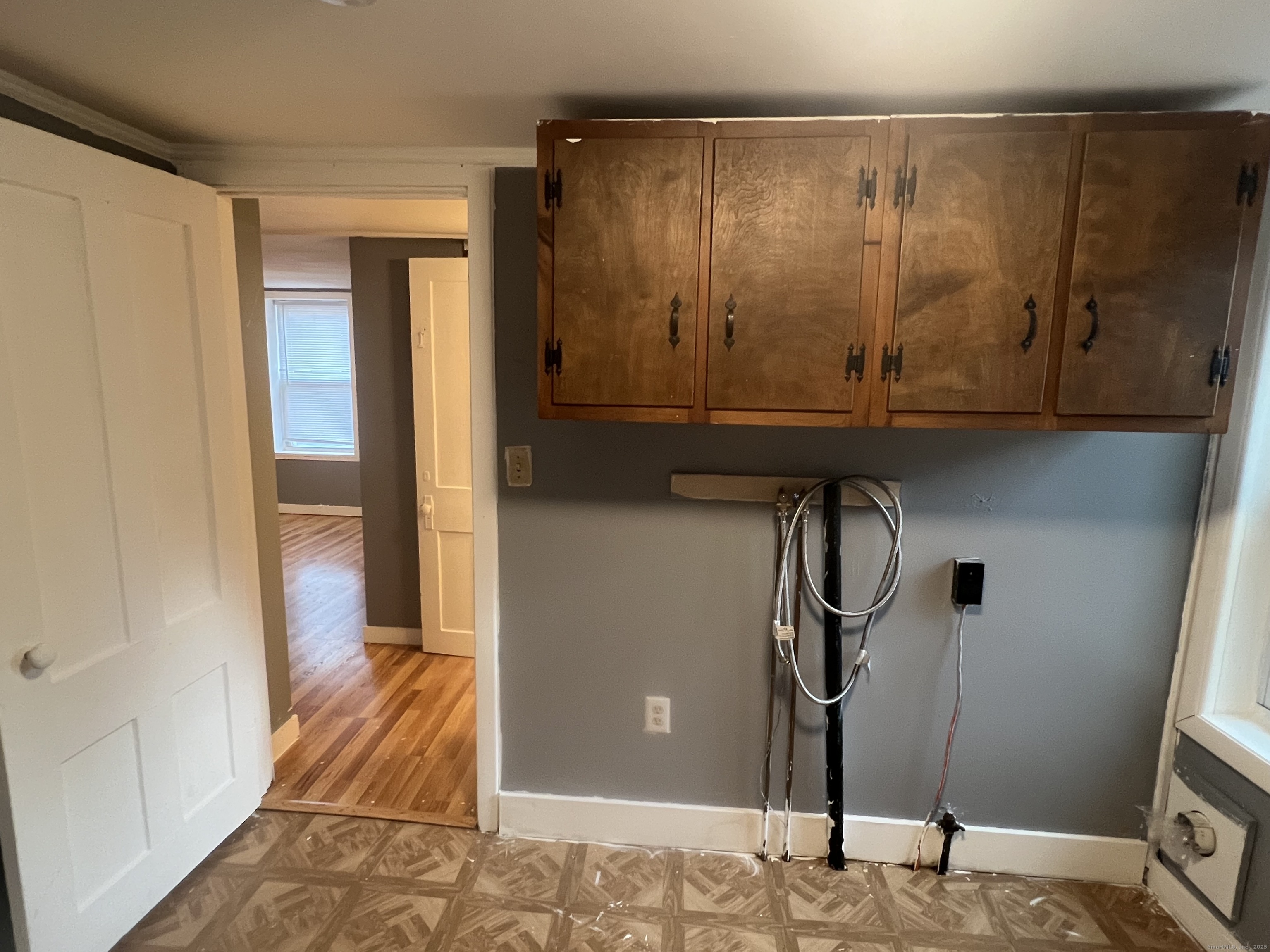 83 Litchfield Street Thomaston, CT 06787 - Photo 11 of 24 a bathroom with a sink and a mirror