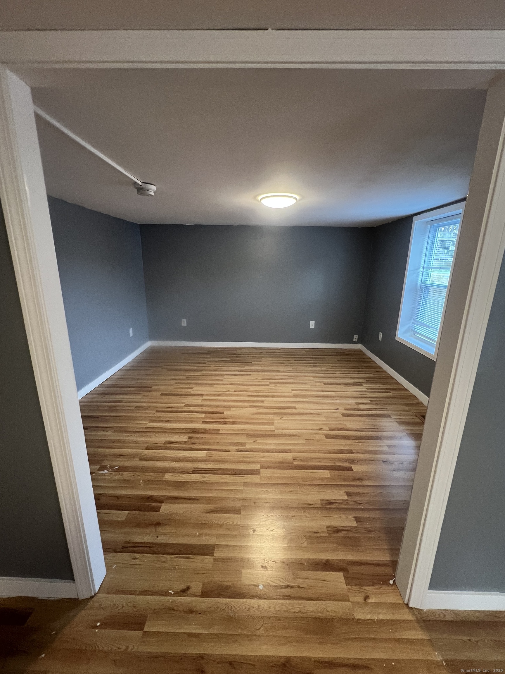 83 Litchfield Street Thomaston, CT 06787 - Photo 20 of 24 a view of a hallway