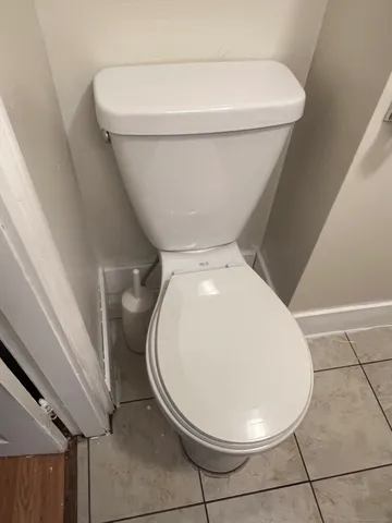 a close view of a toilet in a bathroom