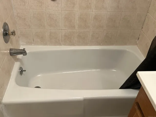 a bathroom with a bathtub