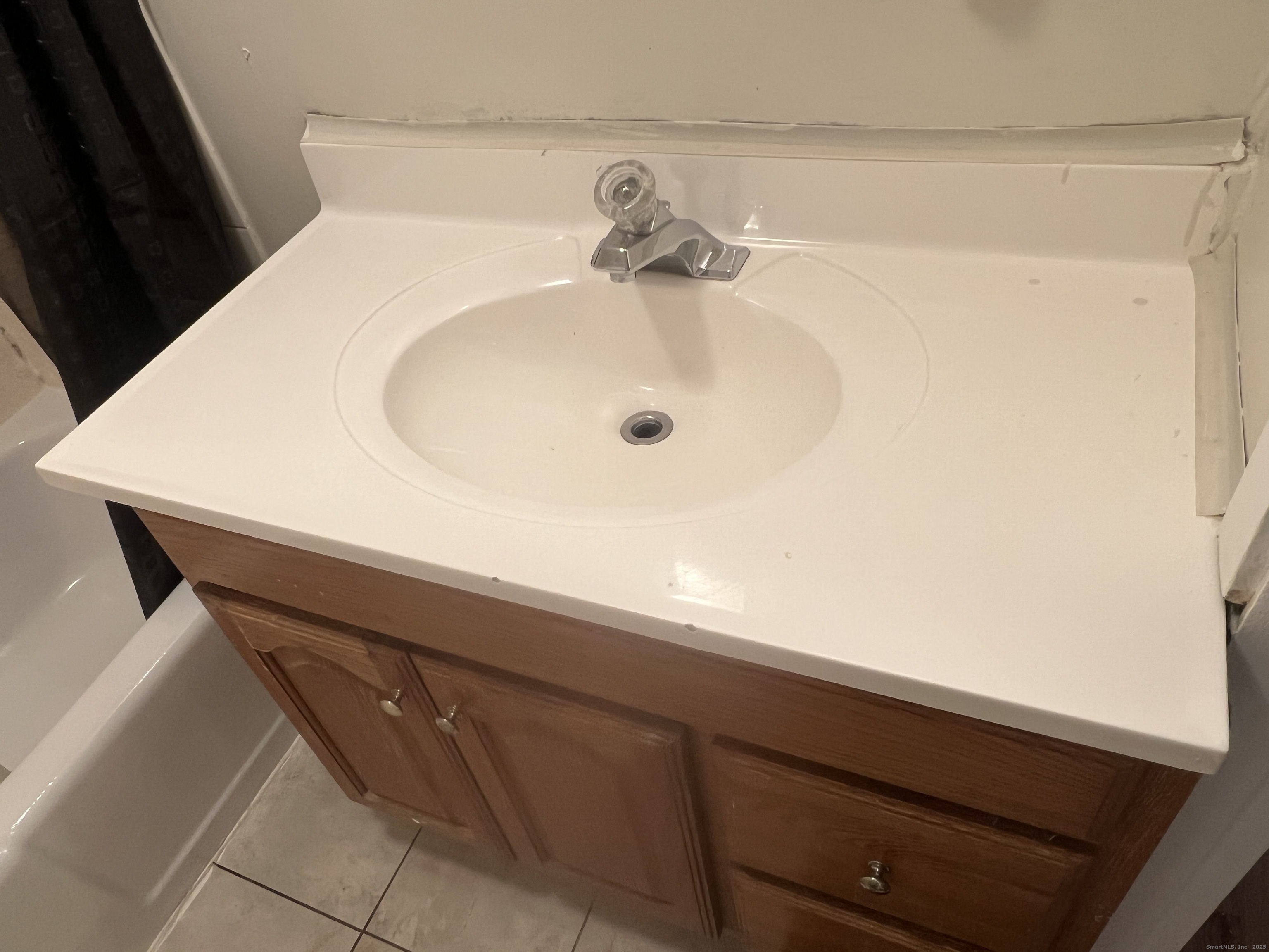 83 Litchfield Street Thomaston, CT 06787 - Photo 10 of 24 a close view of a sink in the bathroom