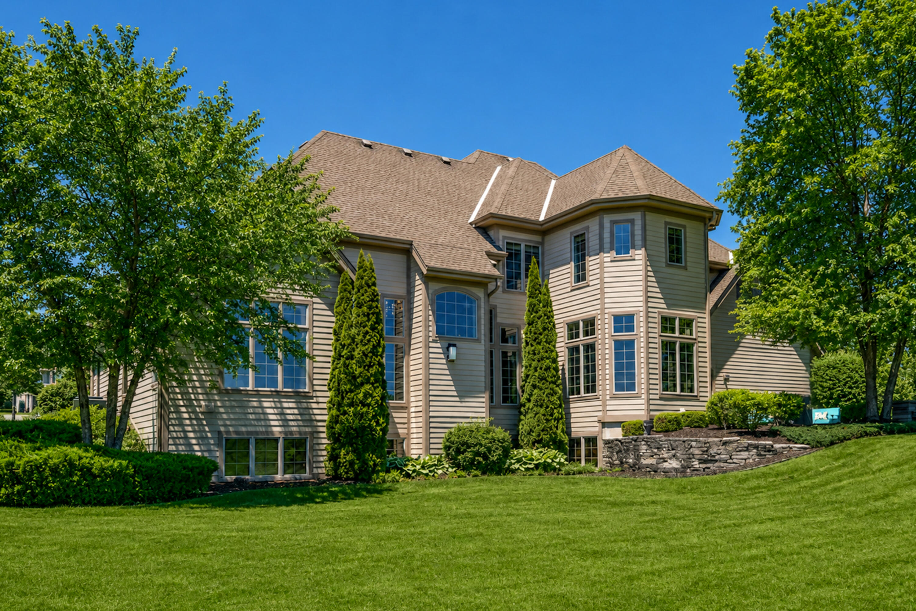 11092 Sutton Ridge Drive Mequon, WI 53097 - Photo 3 of 40 Back Exterior