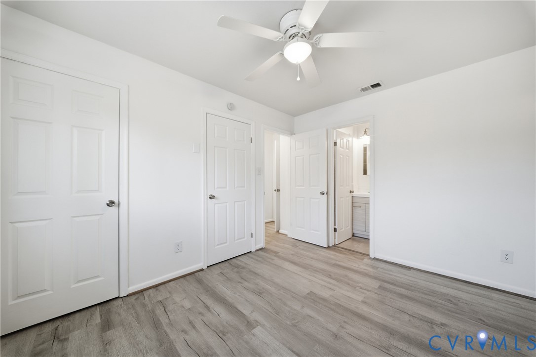 517 Windsor Gate Circle Virginia Beach, VA 23452 - Photo 20 of 47 Primary bedroom with two closets and ensuite bathr