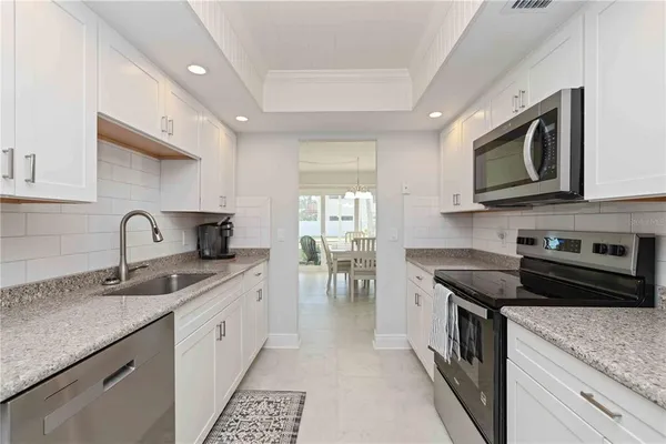 $319,900 | 101 Louella Lane, Unit 11, Nokomis, FL 34275