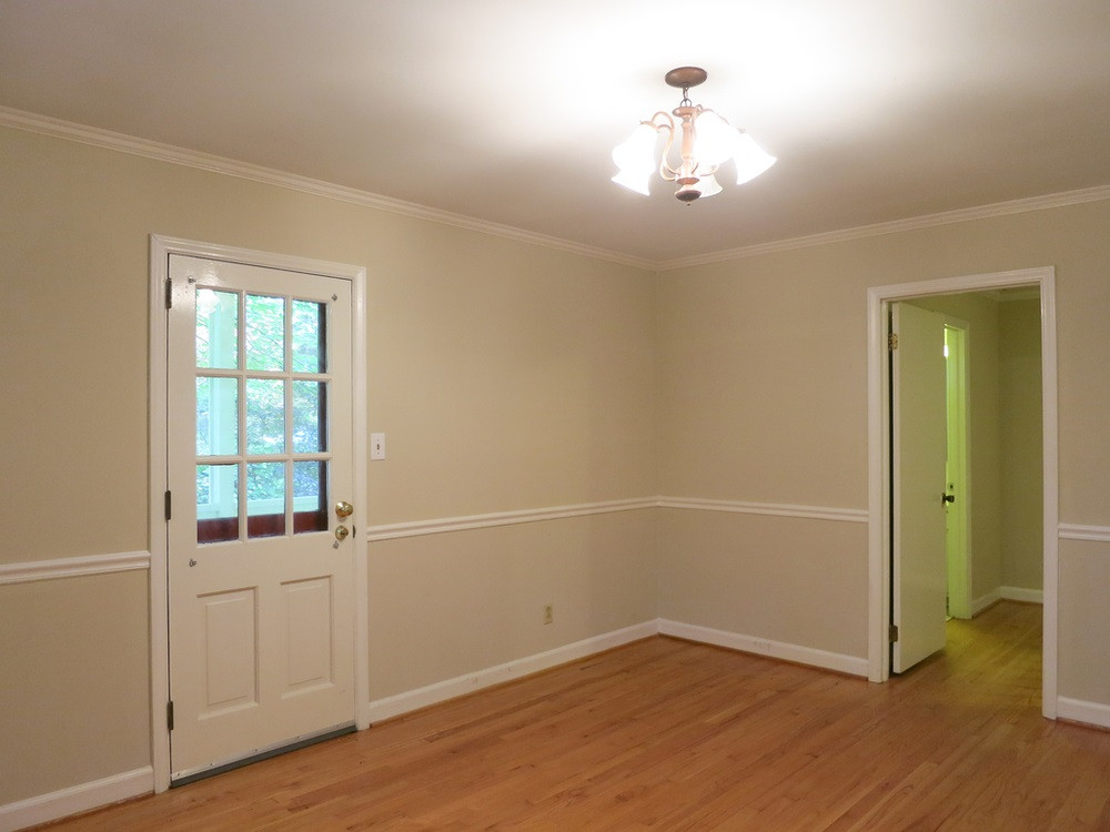 813 Davidson Street Raleigh, NC 27609 - Photo 9 of 30 Spacious formal Dining Rm w/hardwood floor & crown/chair rail molding also accesses the covered front Balcony. Dining Room