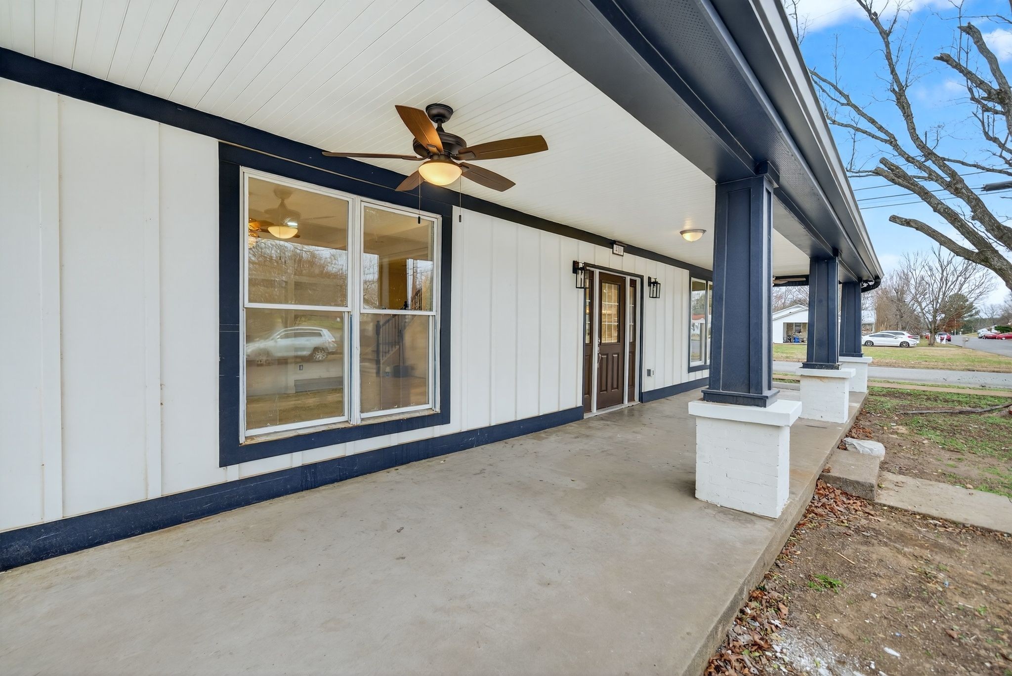 410 3rd Avenue Fayetteville, TN 37334 - Photo 6 of 49 a view of a big room with wooden floor and windows