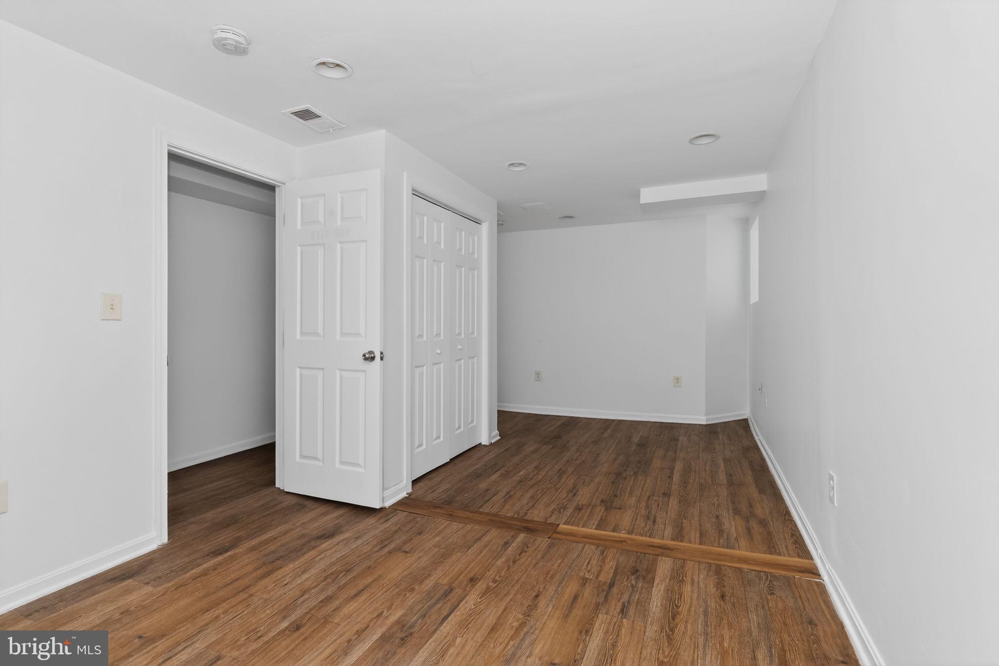 4636 Hillside Road Southeast Washington, DC 20019 - Photo 23 of 44 a view of a room with wooden floor