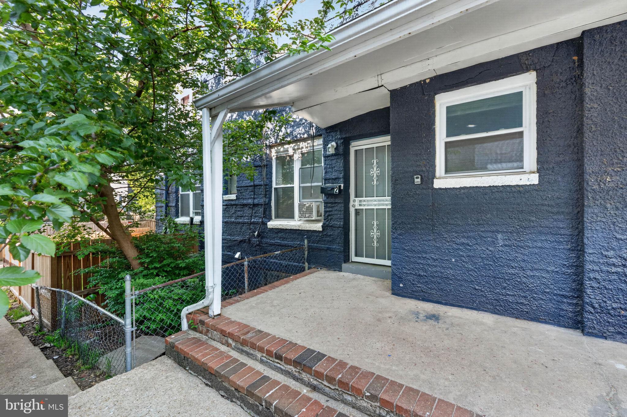 4636 Hillside Road Southeast Washington, DC 20019 - Photo 4 of 44 a house view with a outdoor space