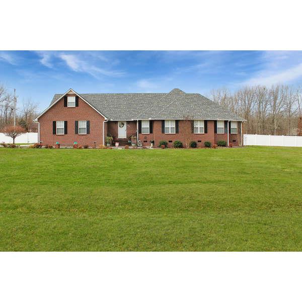 398 Strawberry Ridge Manchester, TN 37355 - Photo 1 of 30 a front view of a house with a yard